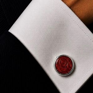 Pewter cufflinks with red enamel swirl pattern