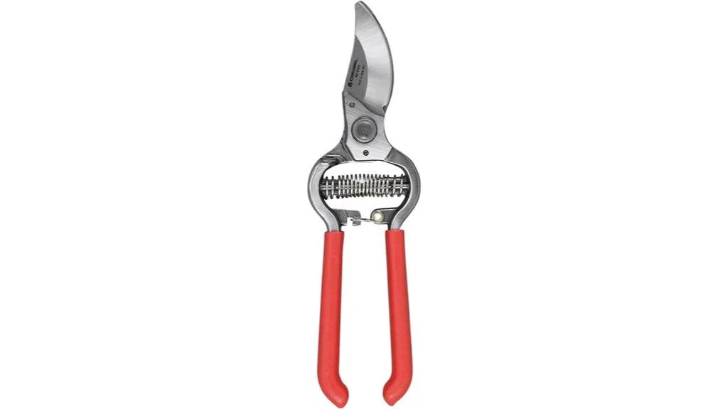 Red handled metal bypass pruning shears against a plain background