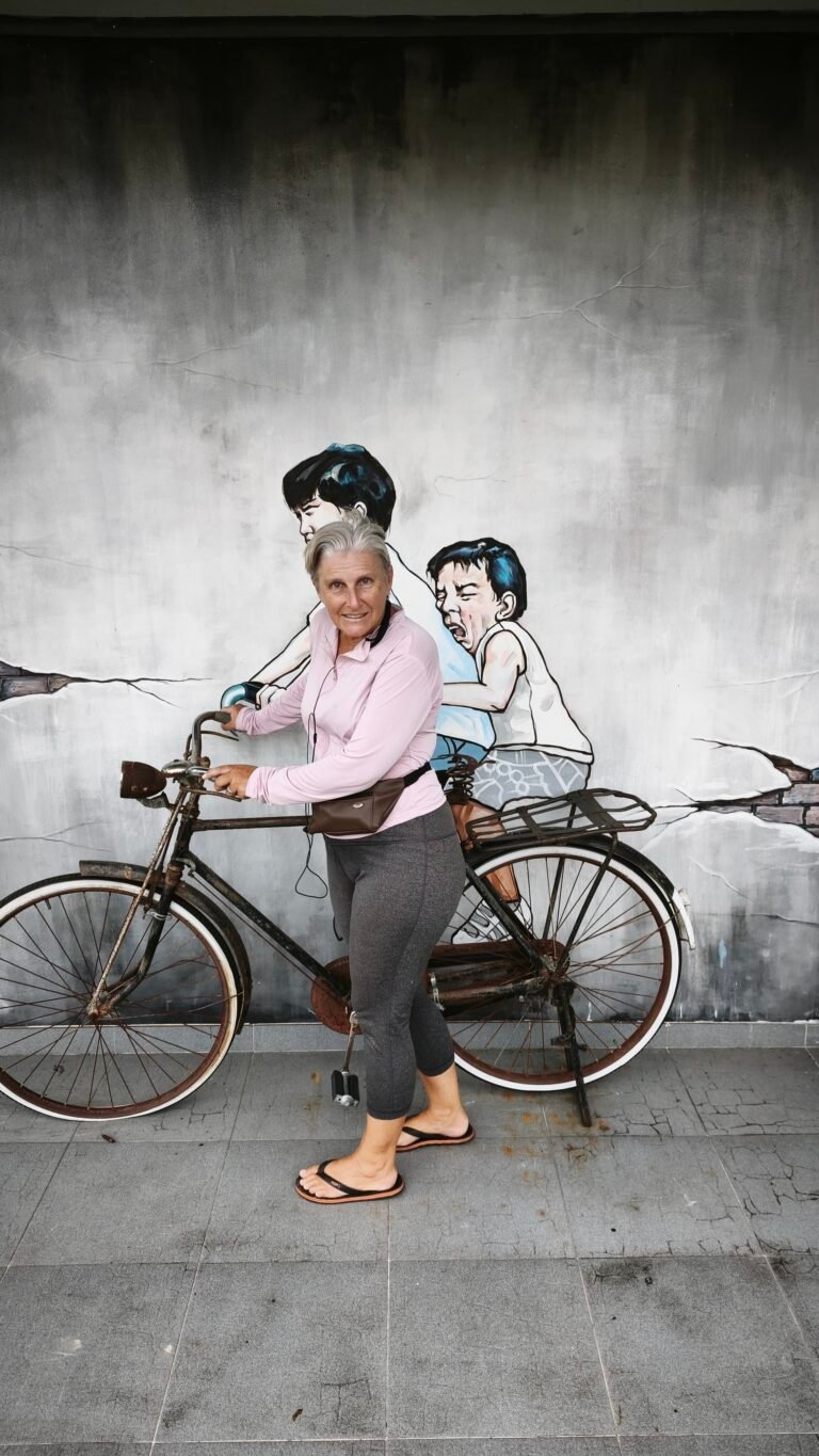 Joanna cycling in Thailand, navigating daily life abroad after 50