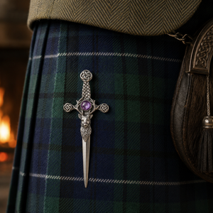 Handcrafted pewter stag head kilt pin on tartan