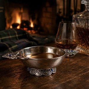 Traditional pewter Scottish quaich bowl with Celtic knotwork handles