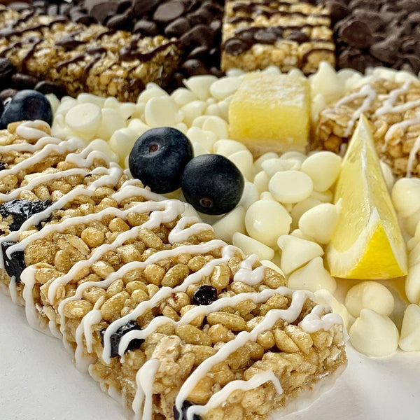 Nut-free snack bars with blueberries, lemon, and white chocolate chips on display