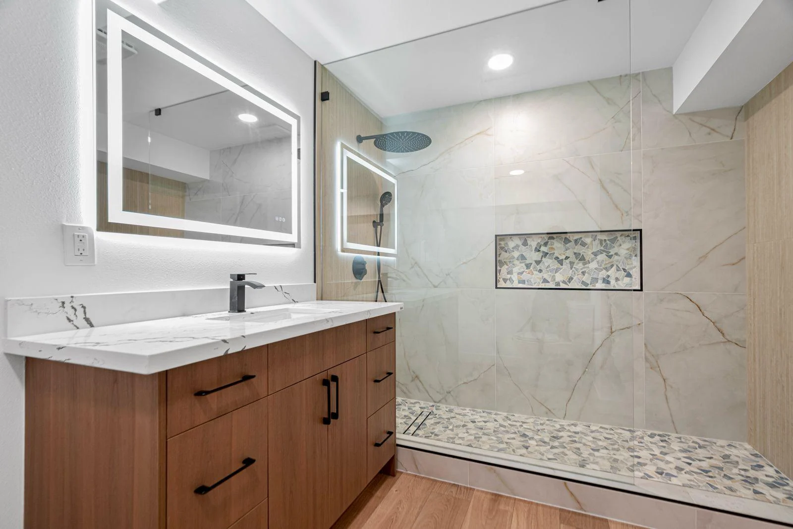 Custom bathroom remodel by North Vision Builders