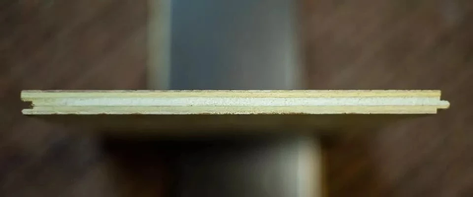 Three-ply plywood core of an engineered hardwood plank
