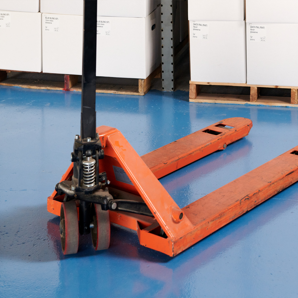Solid color floor coating in commercial storage area