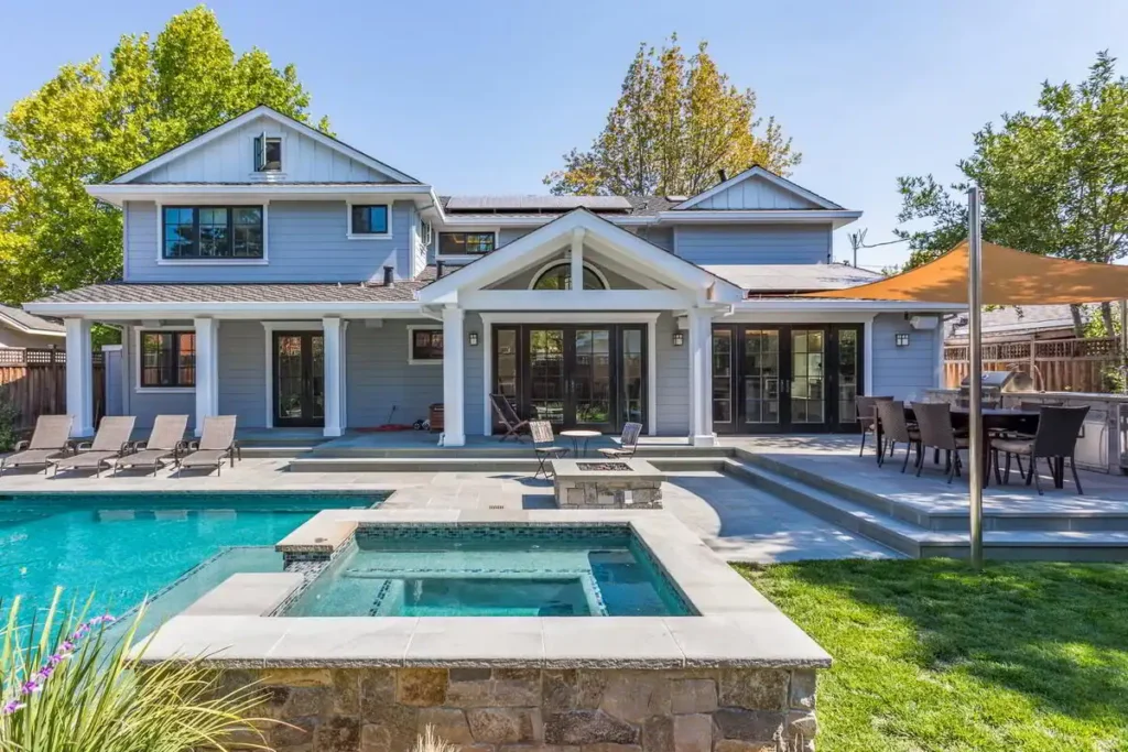 Swimming pool, patio, and surrounding yard