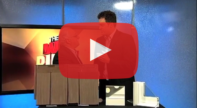 Image 2: Two experts discussing double hung window frame samples and siding options in a video.