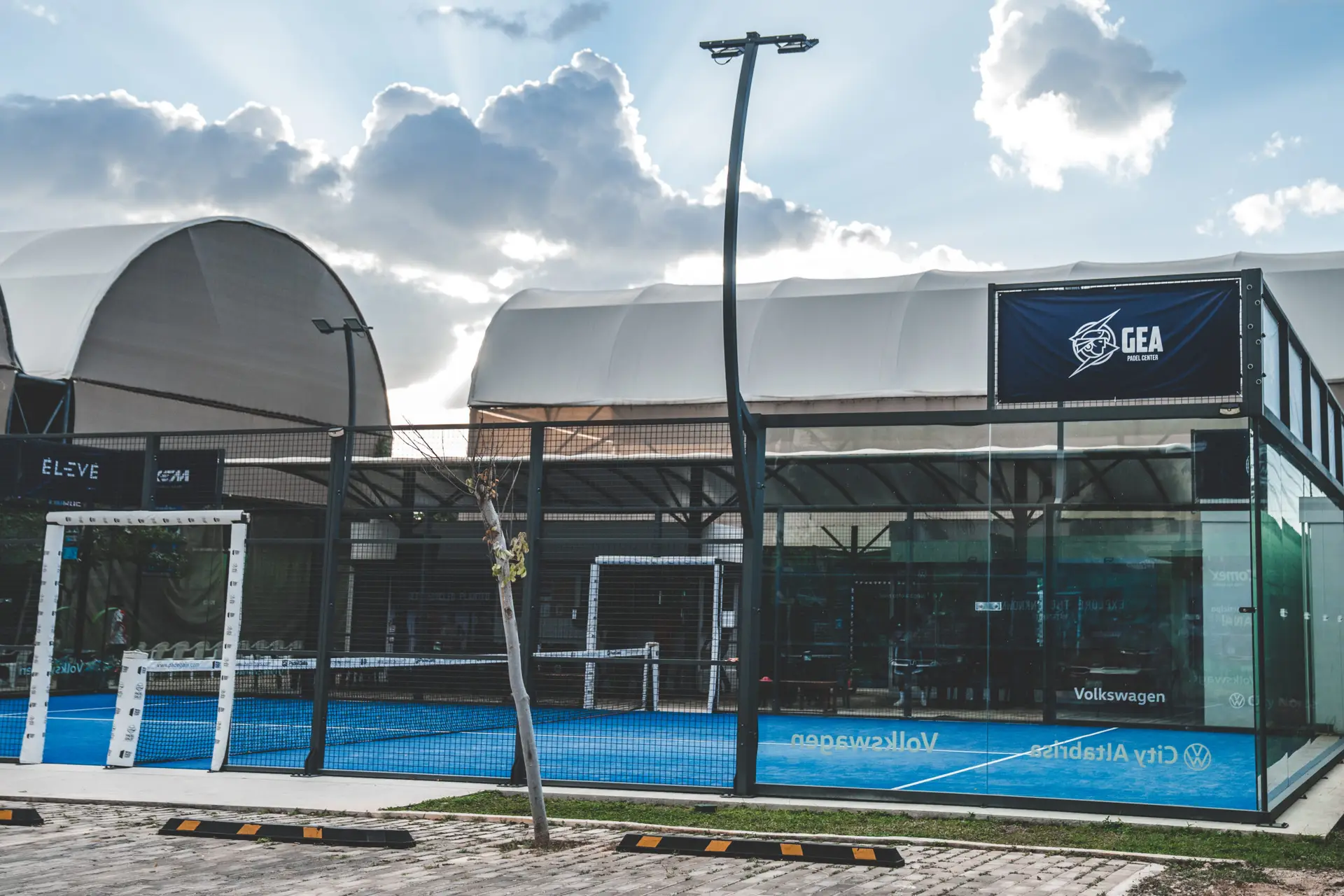 Glass panoramic padel court exterior view