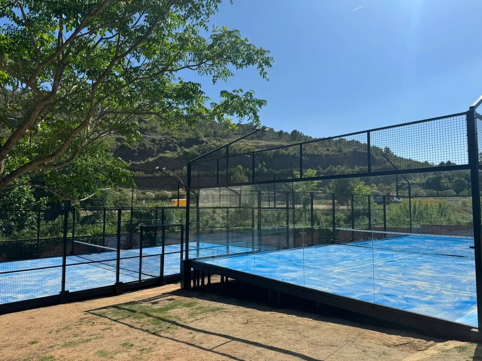 FlexiPadel portable court installation on outdoor surface