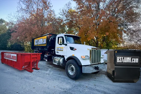 837JUNK roll-off dumpster equipment ready for a roofing project