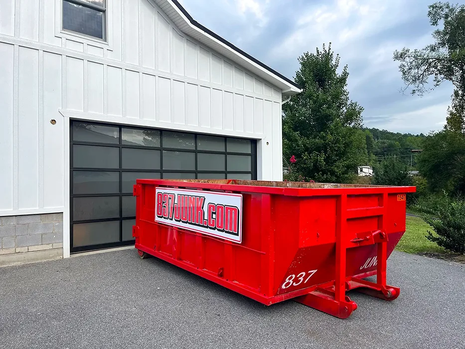 837JUNK dumpster placed at a residential home