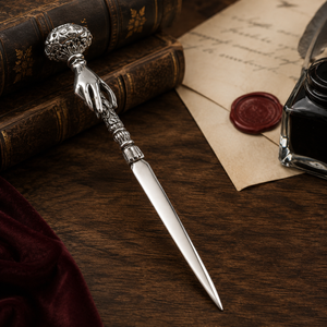 Decorative pewter letter opener with ornate handle
