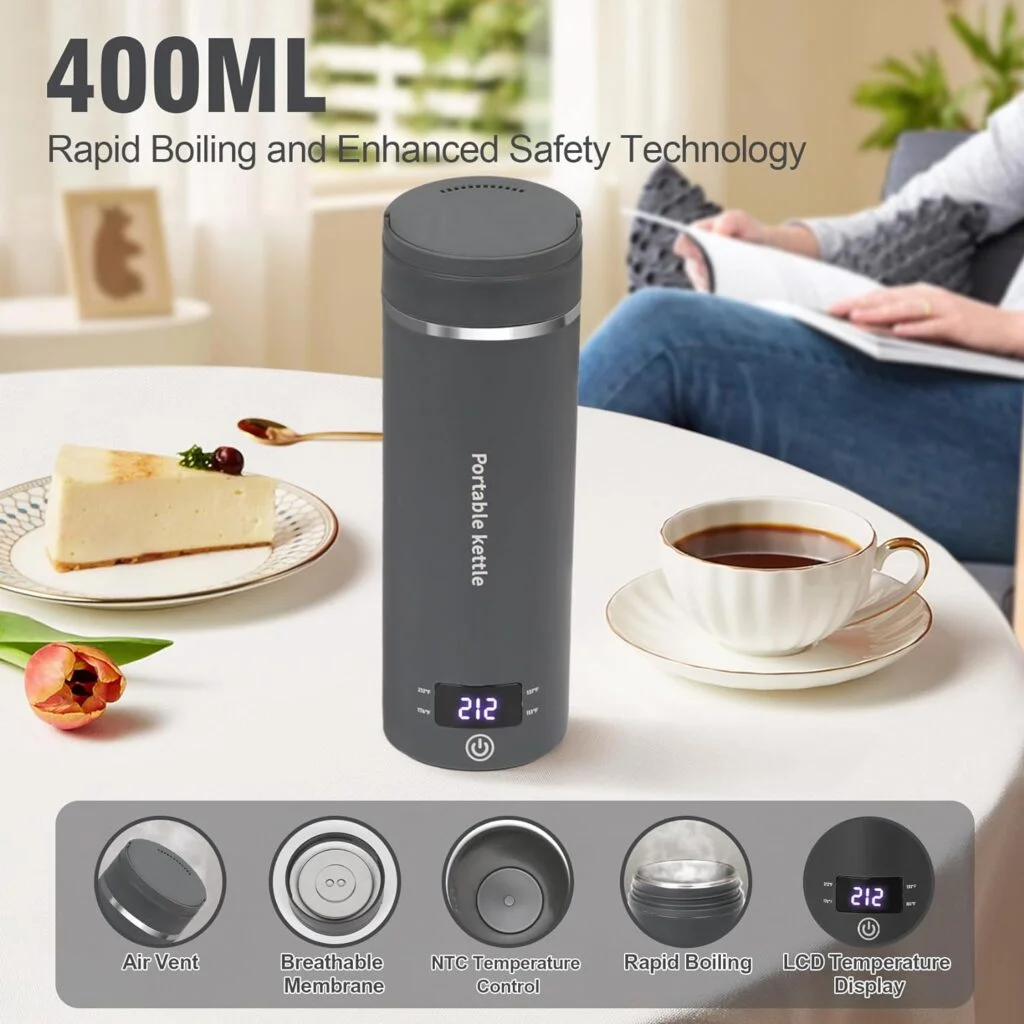 Portable electric kettle beside a cup of tea