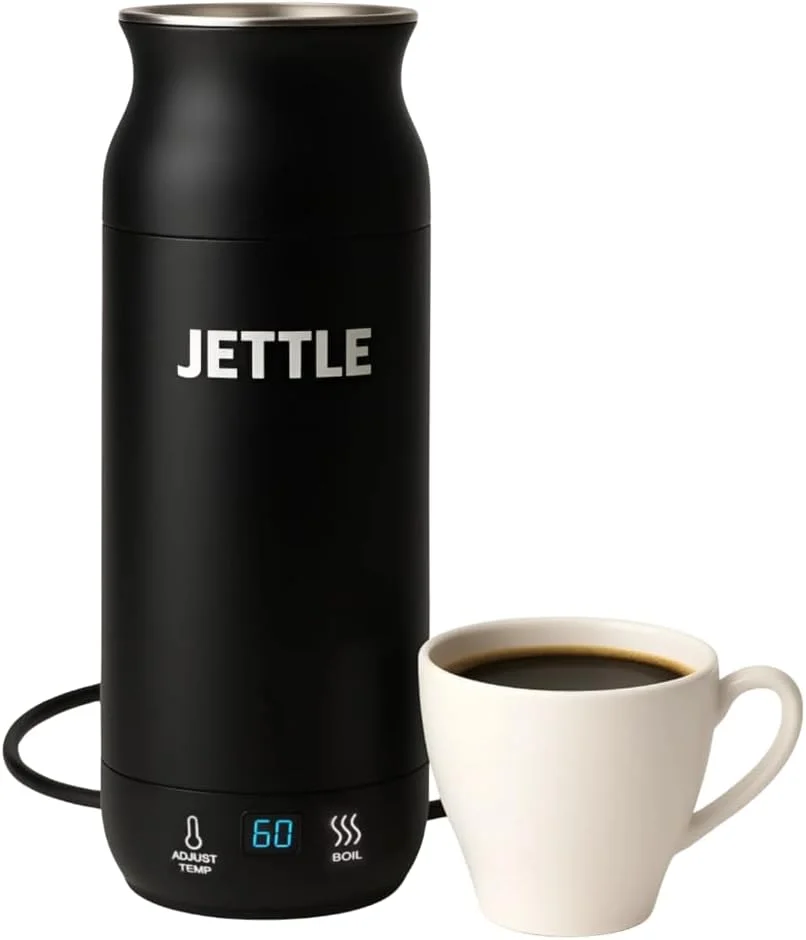 Portable kettle with cord and display beside a cup