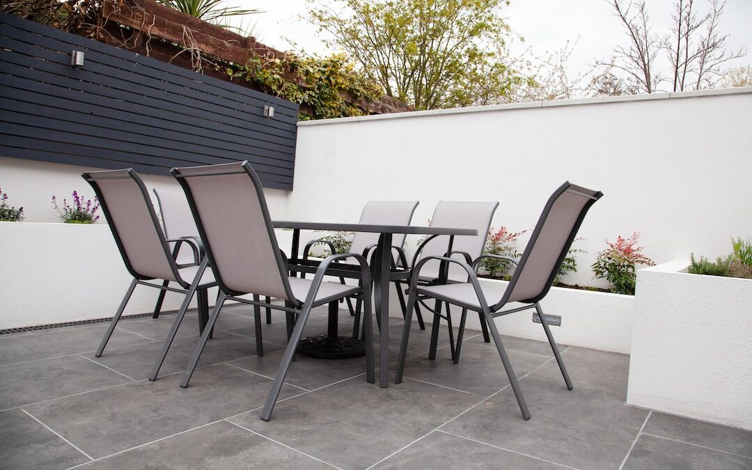 Outdoor patio with finished floor and furniture