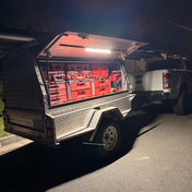 Ute and trailer lit up with an 18V battery powered LED light