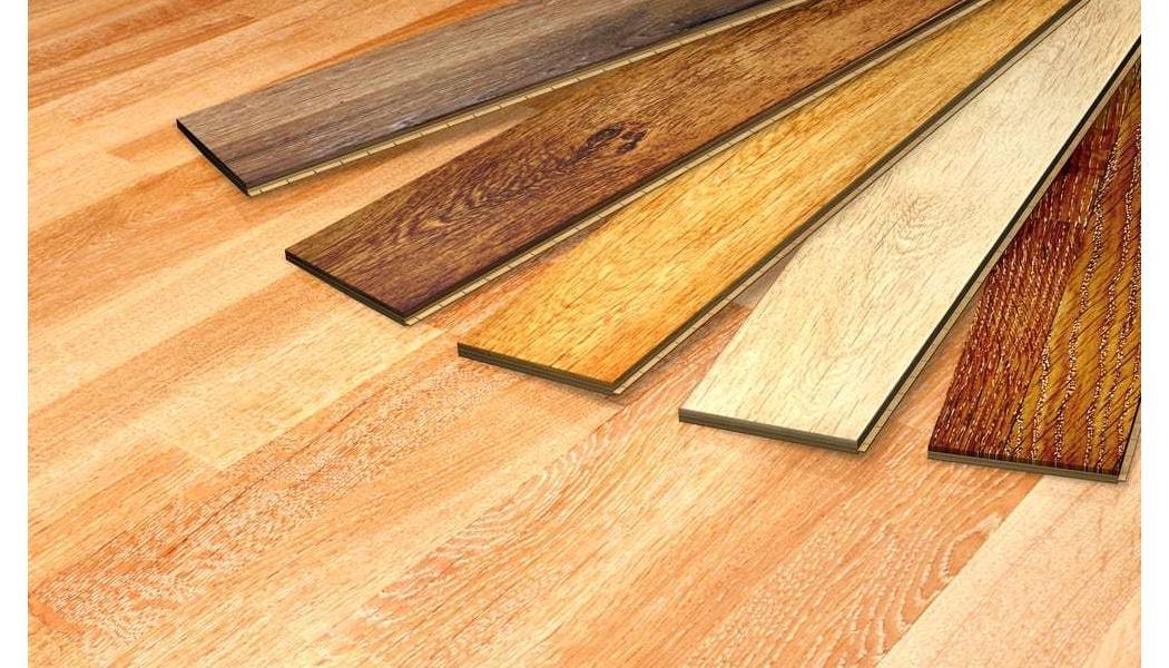 Five hardwood plank color samples showing how stain changes transform a room