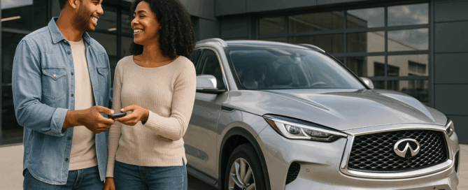 Happy couple with SUV after insurance claim resolved