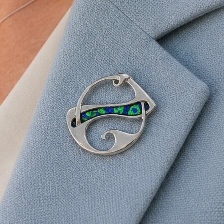 Archibald Knox style pewter brooch with asymmetric Art Nouveau openwork and blue and green enamel
