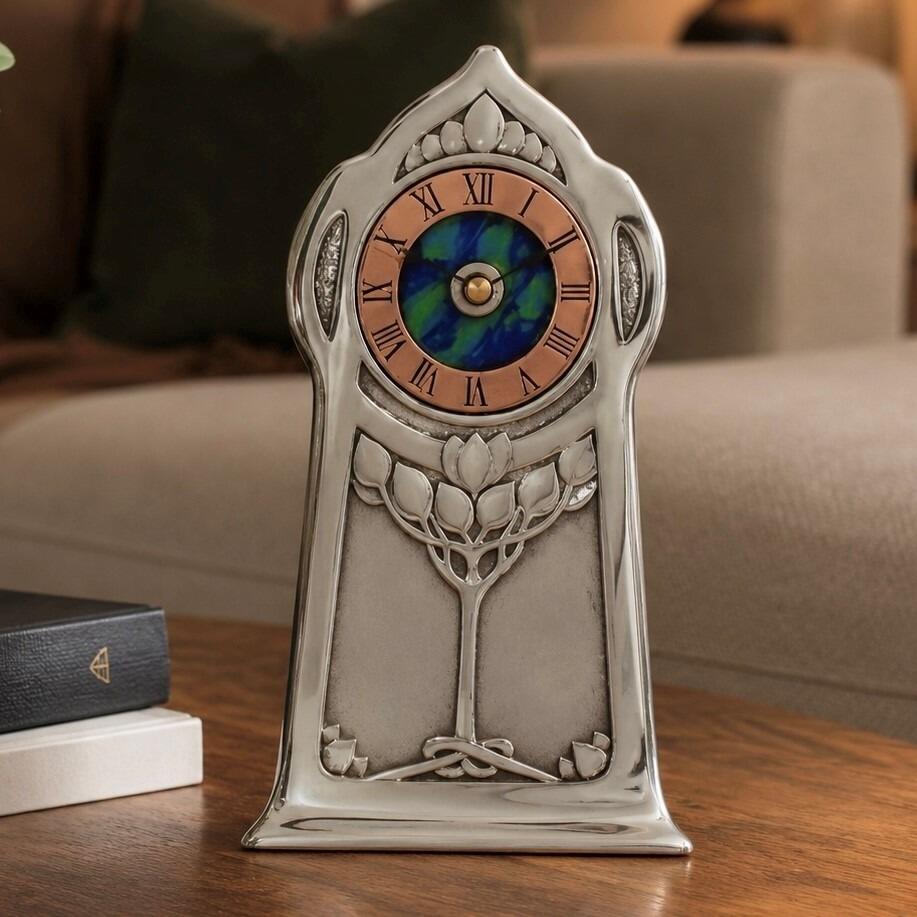 Knox style pewter clock with copper chapter ring and embossed stylised tree design