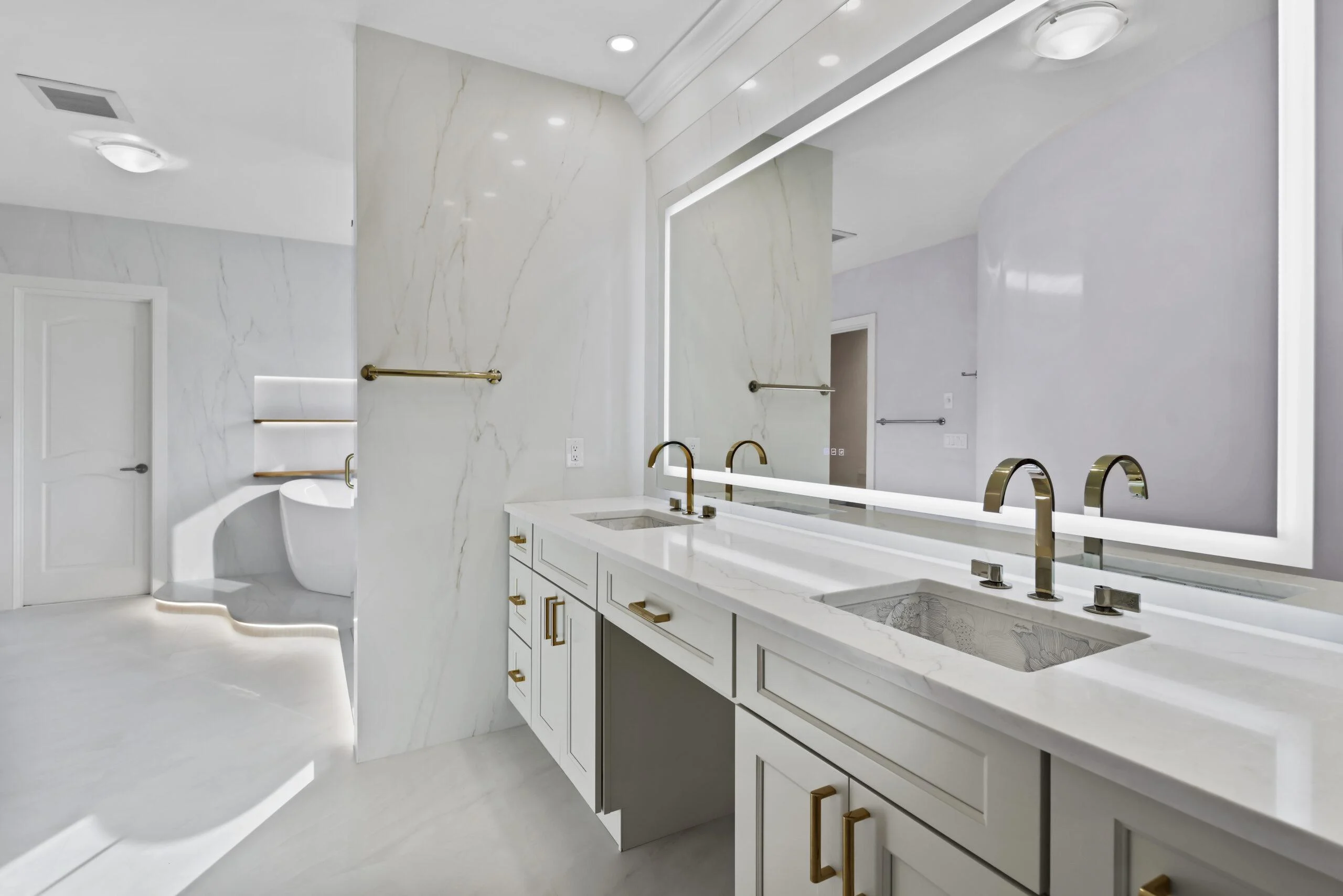 Inside a Luxury Master Bathroom Remodel with Porcelain Slabs and Spa Design