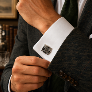 Celtic Knot pewter cufflink on a white shirt