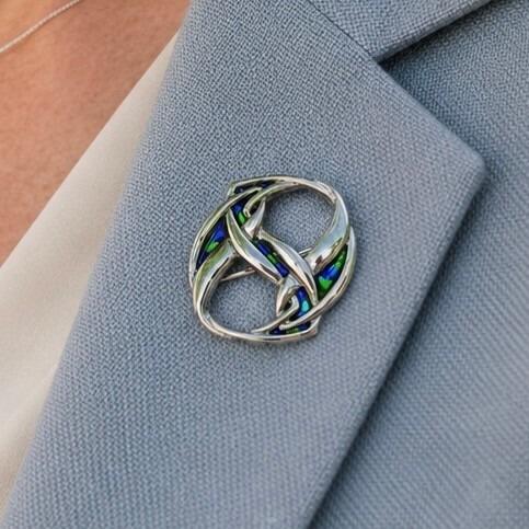 Knox style pewter brooch with intertwined Celtic entrelac bands and enamel inlay