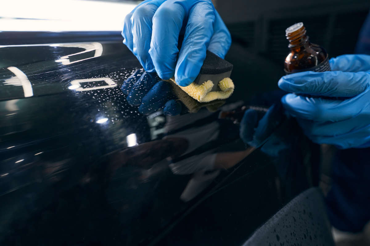 Applying ceramic coating to car surface