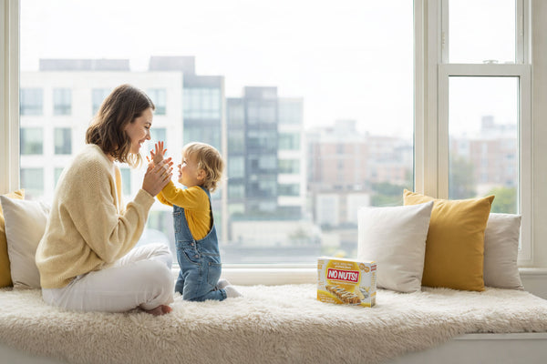 Mother and child enjoying nut-free snack bars